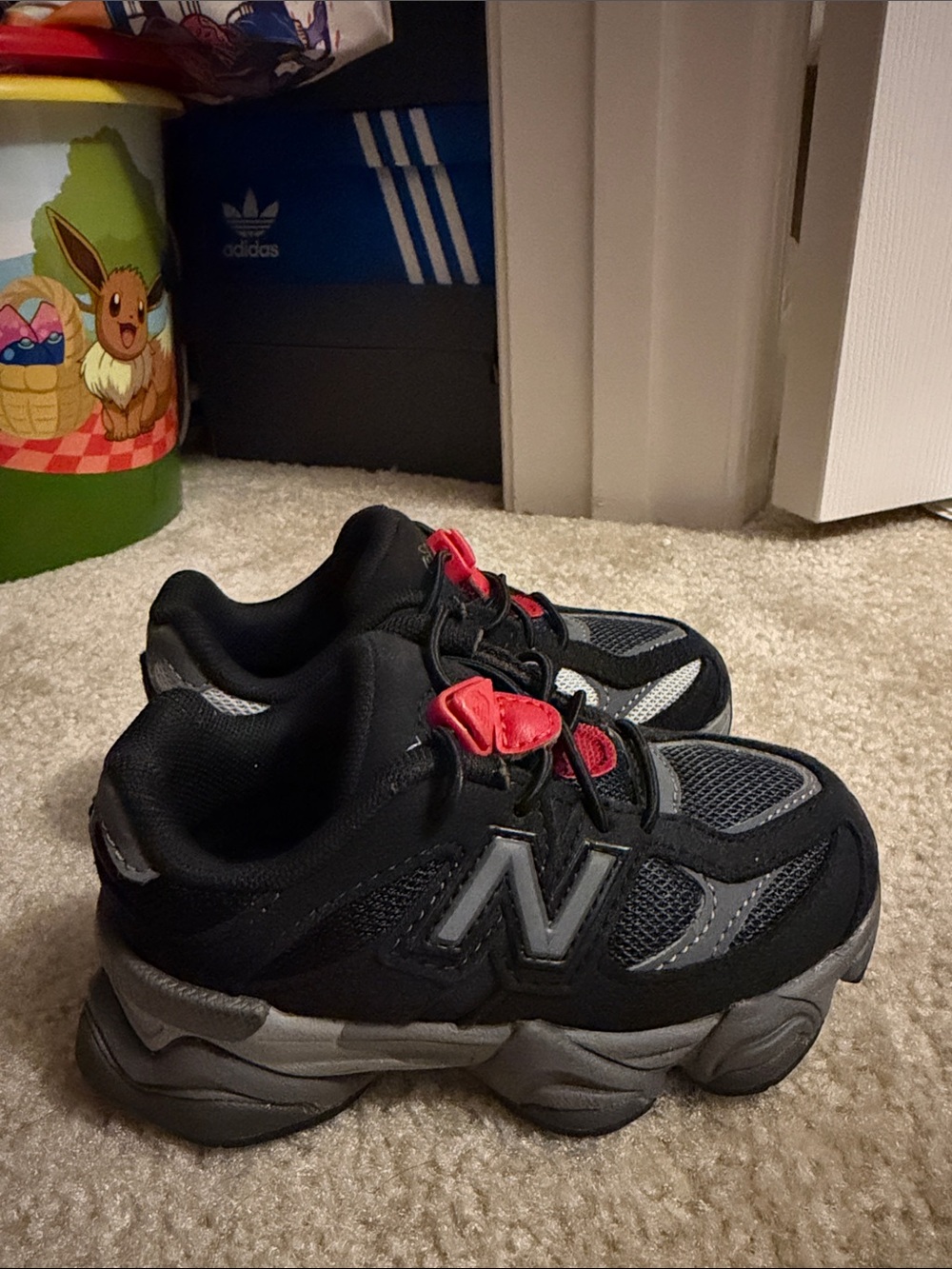 New Balance 9060 Kids Black & Gray Sneakers with Red Accents